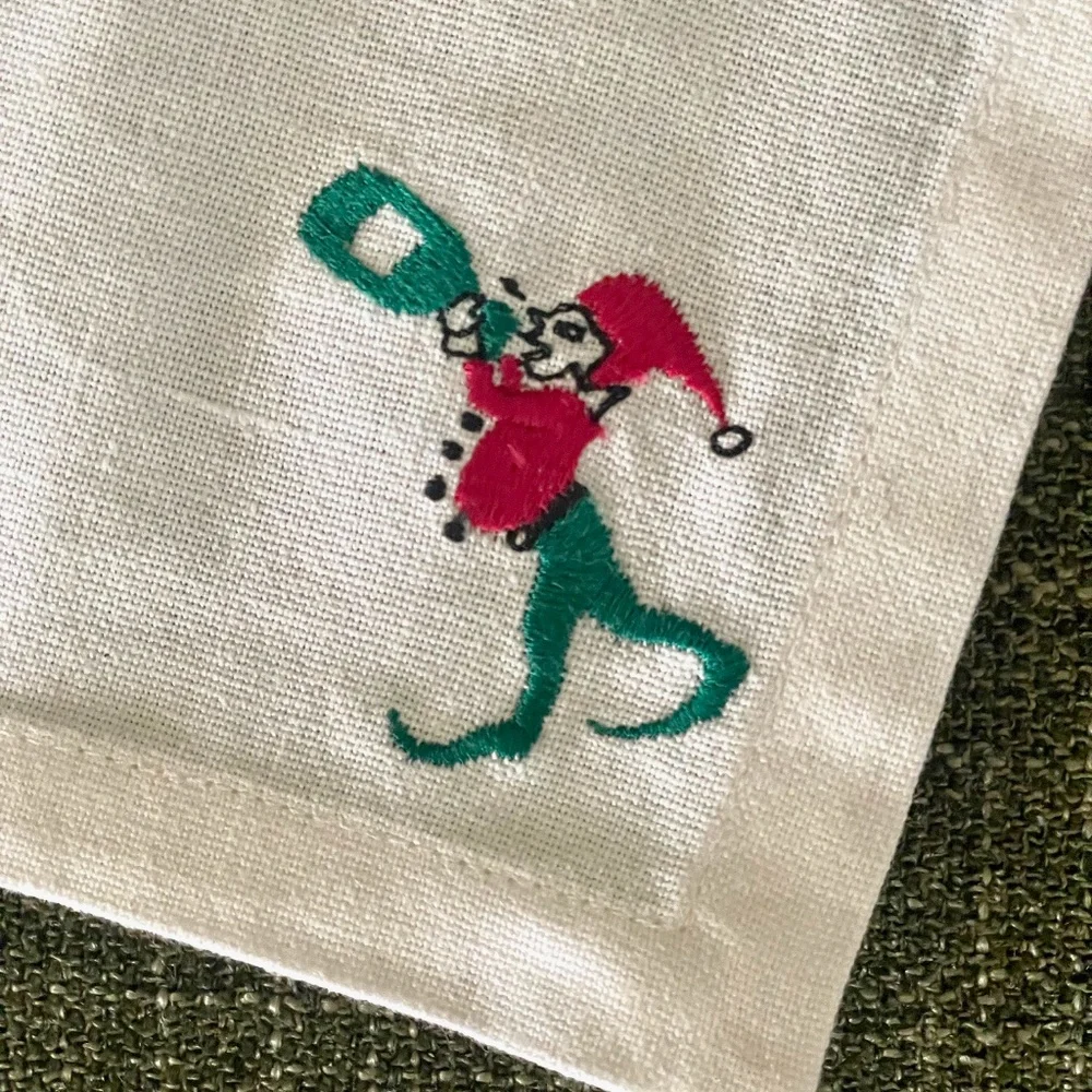 Linen Napkins from RH featuring an embroidered elf